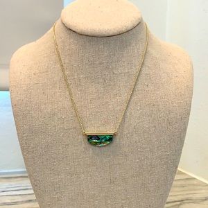 Kendra Scott black mother of Pearl necklace.